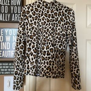 Turtle Neck. Animal Print